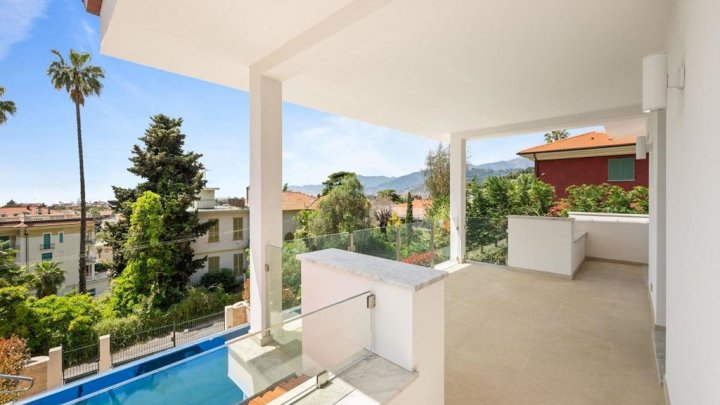 Exclusive designer villa with heated infinity pool and sea view in Bordighera